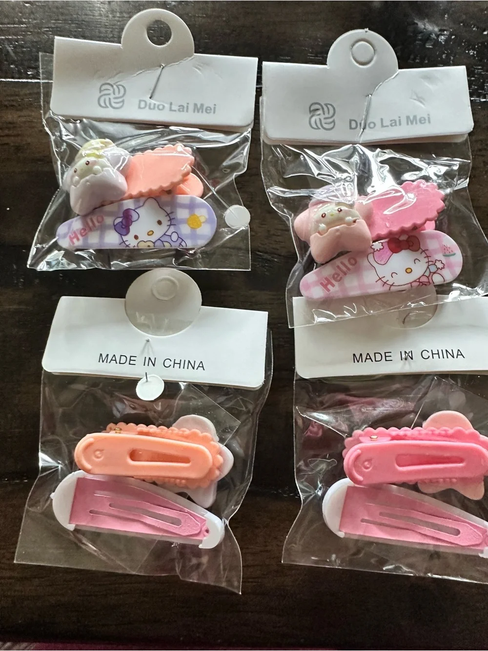 NWT Set of 4 Hello Kitty Child Size Hair Clips Barretts Orange Pink & Purple